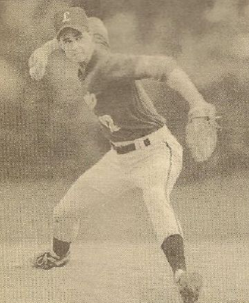 man playing baseball