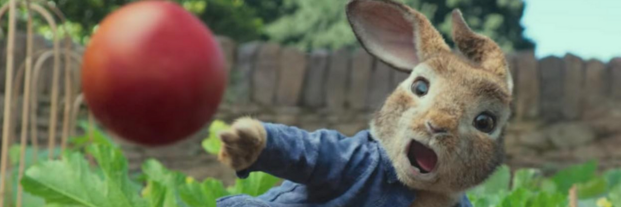 Parents Boycott New 'Peter Rabbit' Movie Over Food Allergy Scene Peter Rabbit throwing a blackberry