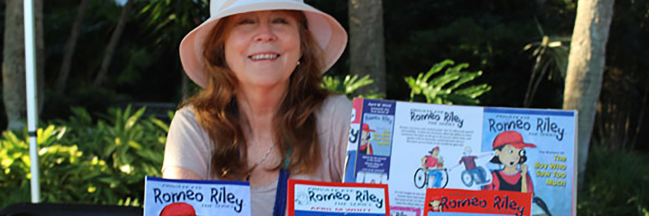 Romeo Riley Private Eye Books Feature Hero With a Disability April M. Whitt with her Romeo Riley books.