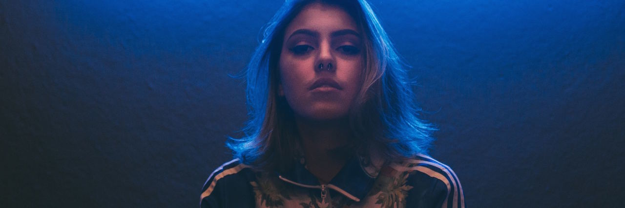 I Have PTSD, but I'm Not a Veteran woman blue background