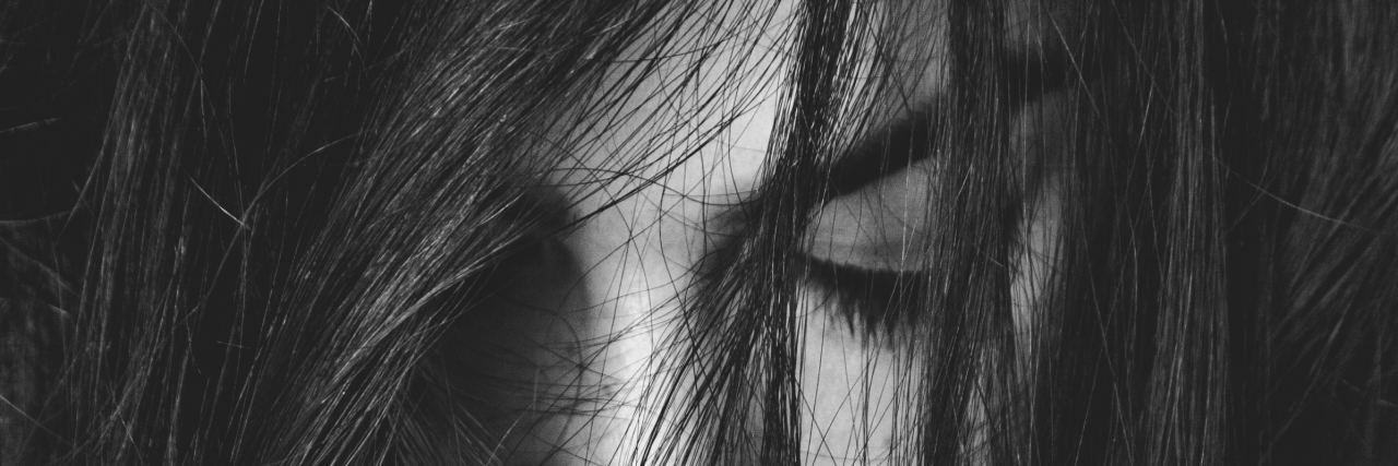How #MeToo Helped Me Say, 'I'm a Rape Survivor' woman with nose ring looking down