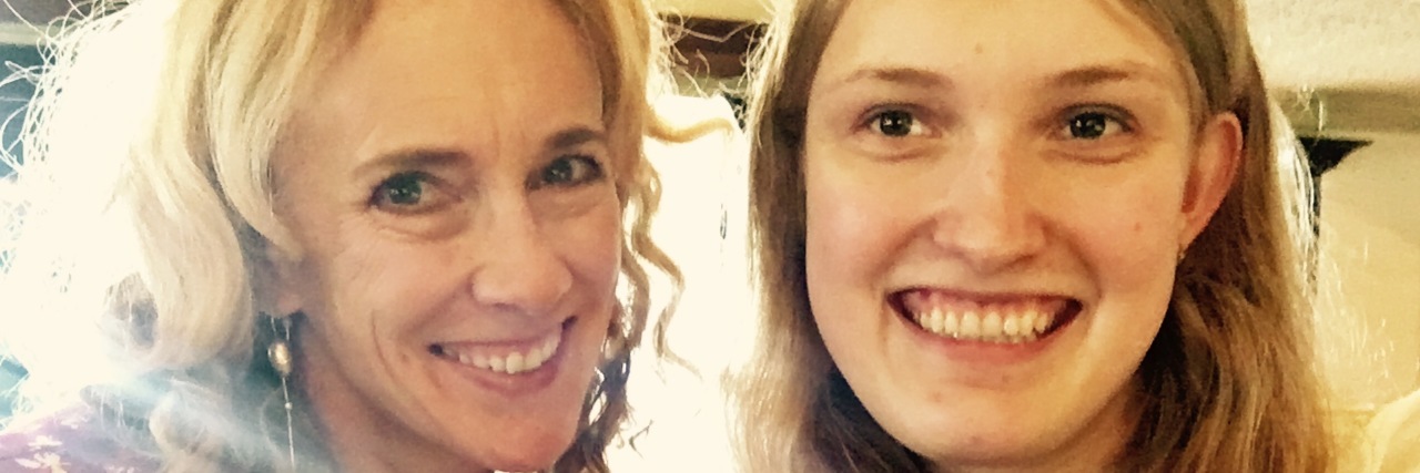 How My Child's Autism Taught Me The Healing Power of Self-Love Mother and daughter smiling at camera