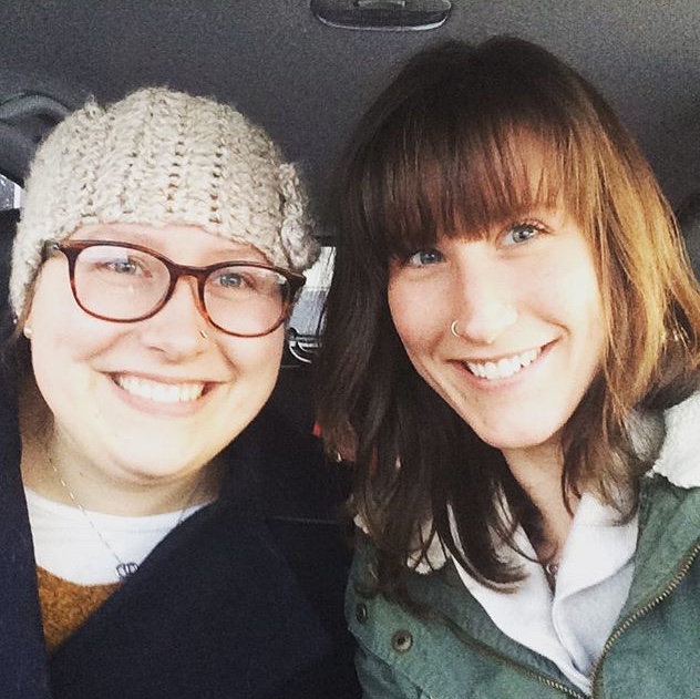 woman living with eating disorder and supportive friend smiling for camera