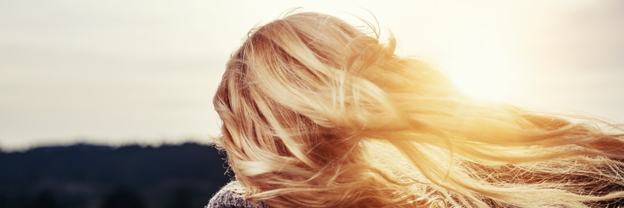 10 of My Cancer Lessons to Help You Cope back of a woman with blonde hair