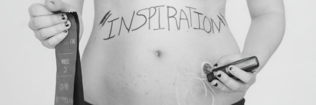black and white photo of a woman standing in her underwear giving herself an injection in her stomach with the word 'inspiration' written across her abdomen