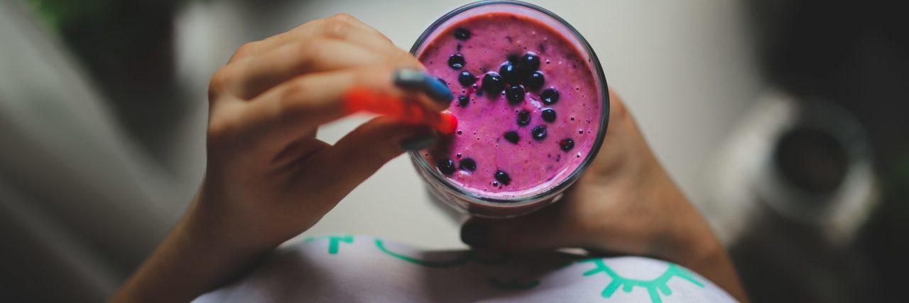 How ‘Almost Anorexia’ Is Different From ‘Normal’ Habits perspective view of woman holding smoothie
