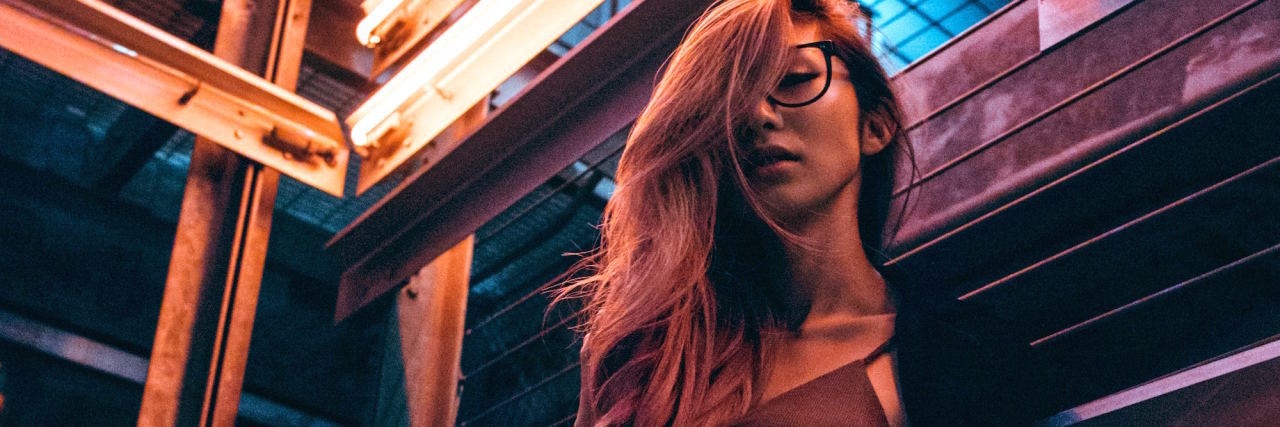 When Anxiety Has You Anticipating the Day Everyone Will Leave You woman in neon light