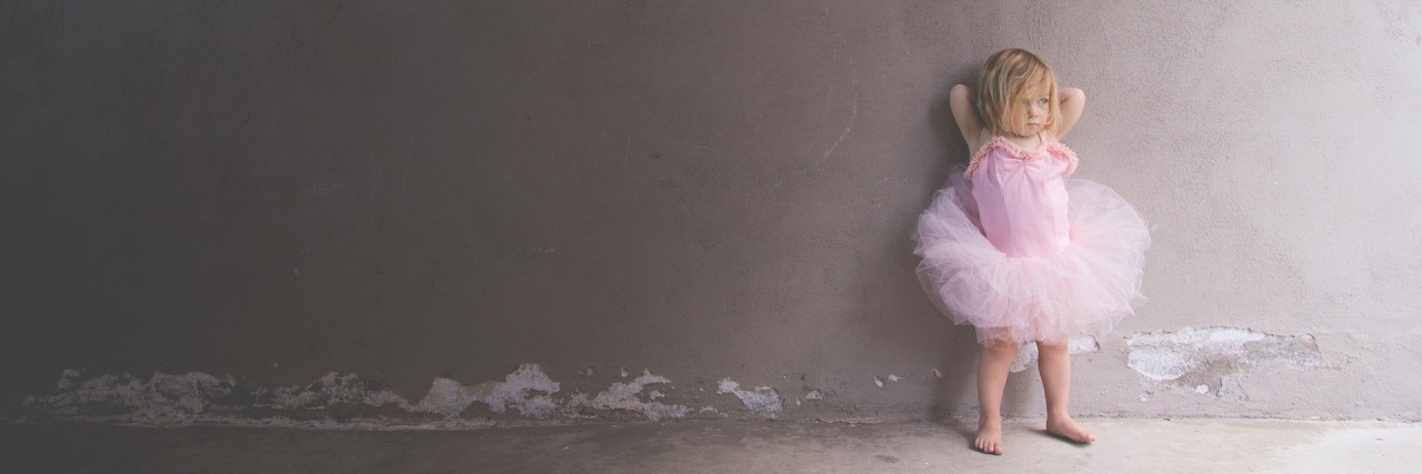 Growing Up With Brachial Plexus Injury From Birth Trauma Little girl in pink ballet outfit.