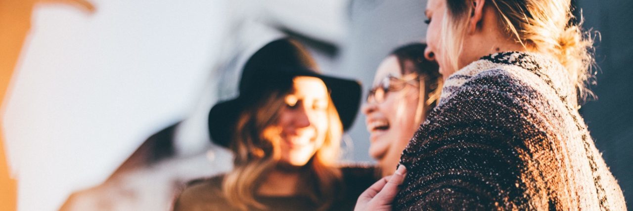 The Best Ways to Support a Friend in Eating Disorder Recovery group of female friends laughing together