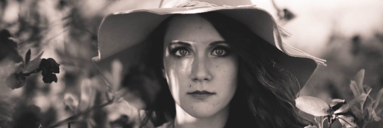 When Anxiety Makes You Look 'Fine' on the Outside woman in hat