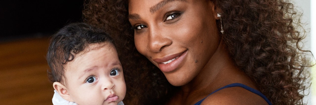Serena Williams and her baby smiling