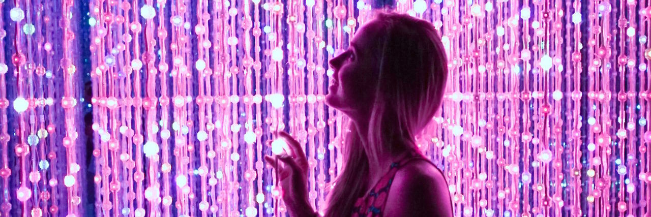 What Borderline Personality Disorder 'Impulsivity' Looks Like woman purple background