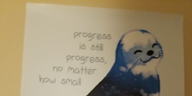 picture of a seal with progress quote