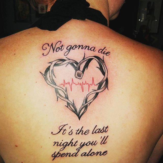 a back tattoo of a heart