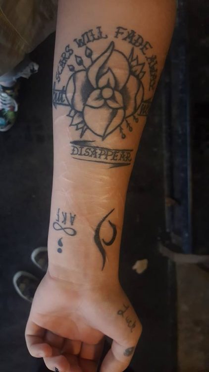 tattoo says warrior