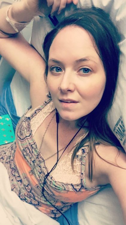 woman selfie in hospital bed