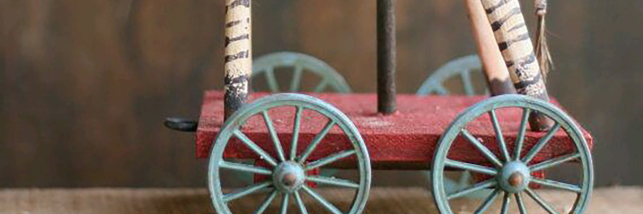 Getting a Wheelchair in the U.K. With Ehlers-Danlos Syndrome Zebra toy on wheels.