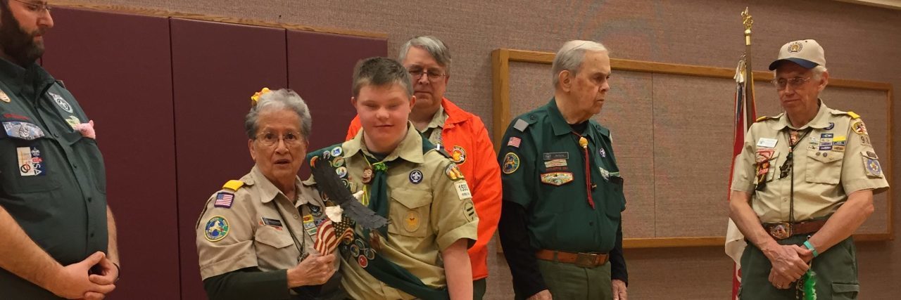 Logan Blythe with local Scout leaders accepting his project for Eagle Scout