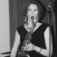 A photo of the writer playing the saxophone.