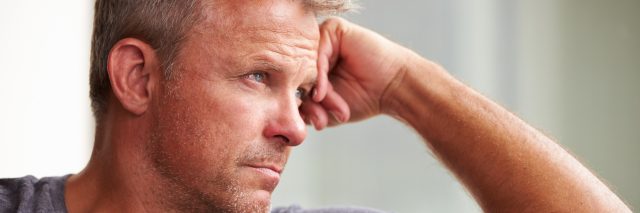 Mature Man Suffering From Depression At Home
