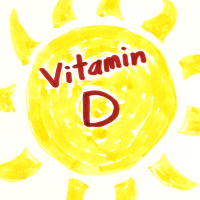Notepad with vitamin D and pills on the table.