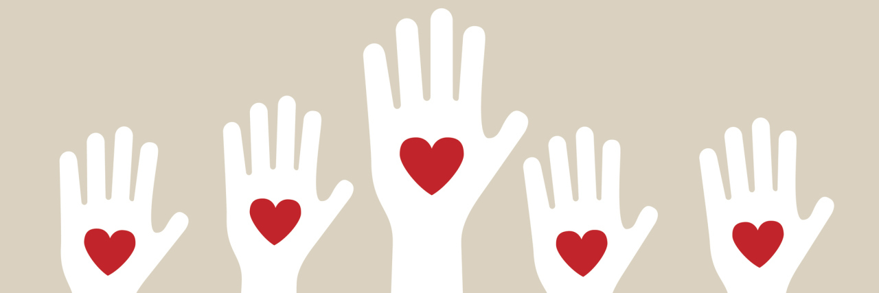 How I Went From Being a Solo Heart Patient to Finding My 'Band' People raising their hands with hearts on them.