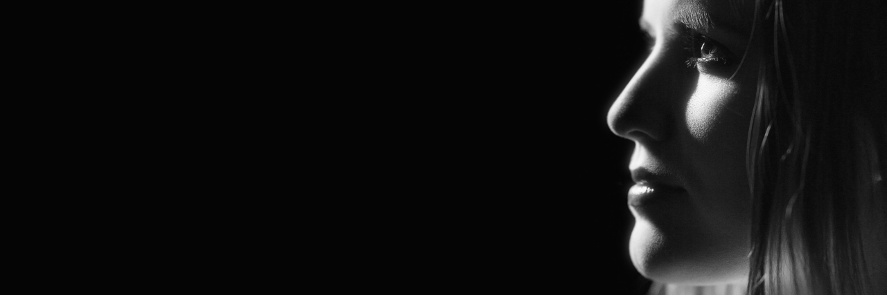 4 Steps to Help Fight Against Diet Culture profile of young sensual woman on black background monochrome image