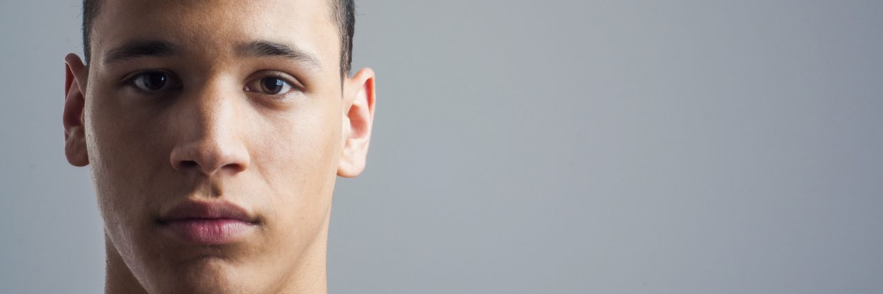 Why I Decided to Talk About My Stuttering on Social Media Young man's face