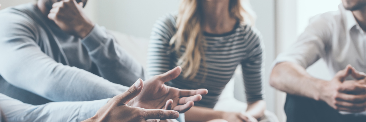 What I Wish People Knew About Mental Health Close-up of people communicating while sitting in circle and gesturing