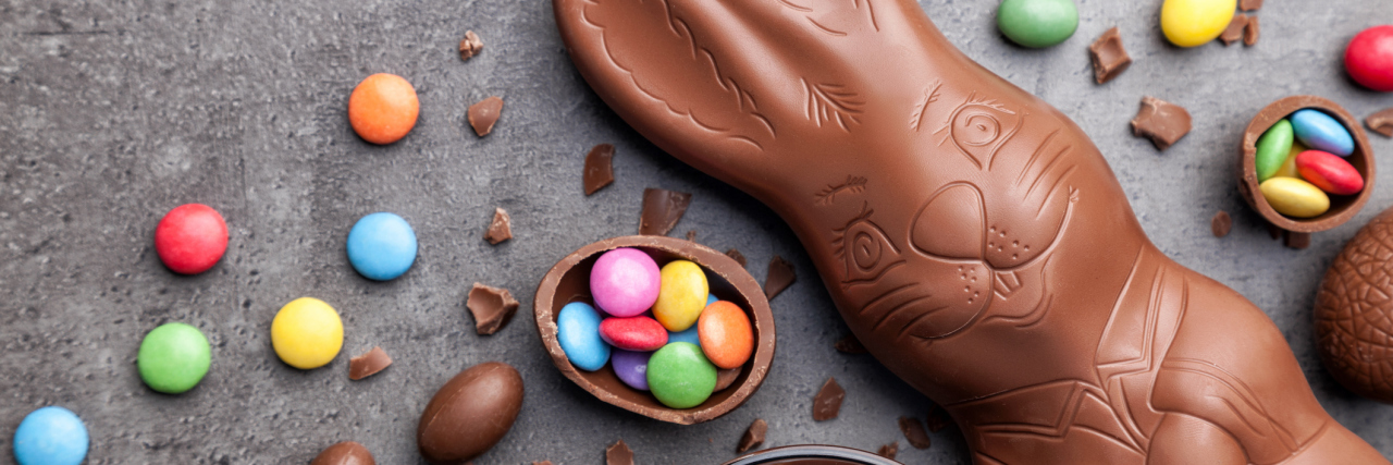 'Healthy' Easter Chocolate Is Hard for Me as Someone With Orthorexia Delicious chocolate Easter bunny, eggs and sweets on rustic backgroundDelicious chocolate Easter bunny and eggs on rustic background