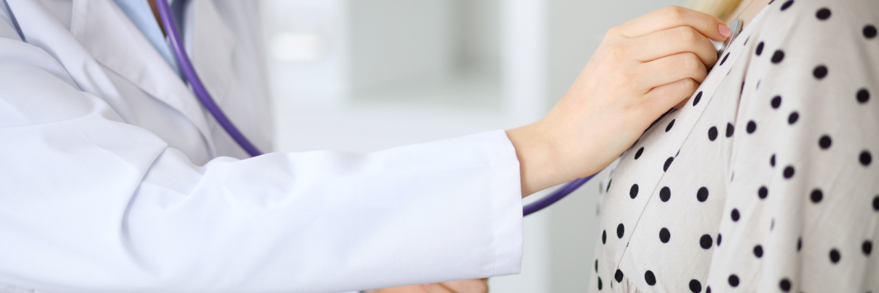 4 Lessons I've Learned From an Unexpected Diagnosis A doctor listening to a patient's heart.