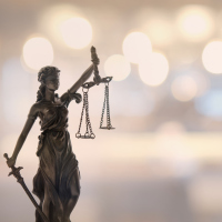 Status of the lady of justice, balancing the scales in her hands