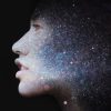 double exposure of a woman's face and stars