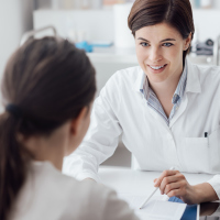 female doctor talking with her patient