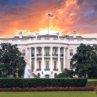 White House, under dramatic sky.