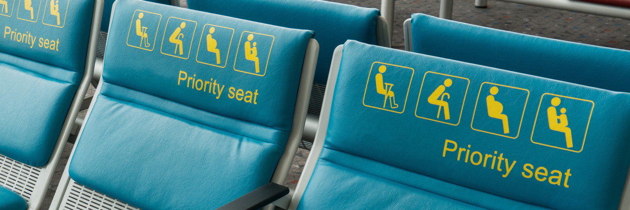 Getting Questioned About Using a Disability Seat on the Train Priority seats reserved for disability.
