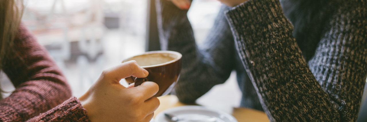 Why It's Important to Talk to People Who Also Have Fibromyalgia women talking in a cafe over coffee