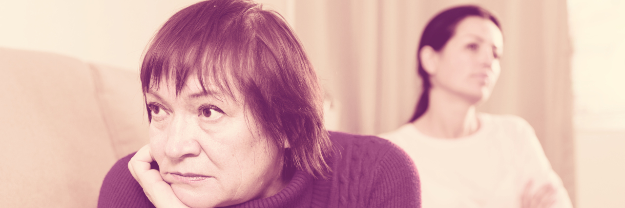 Being Told 'I Hope You Don't Have Autism' Unhappy women sitting on sofa after argument.