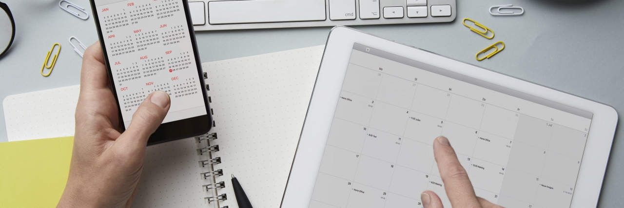 15 Things People Don't Realize You're Doing Because Pain Is Normal a phone and tablet with calendars open