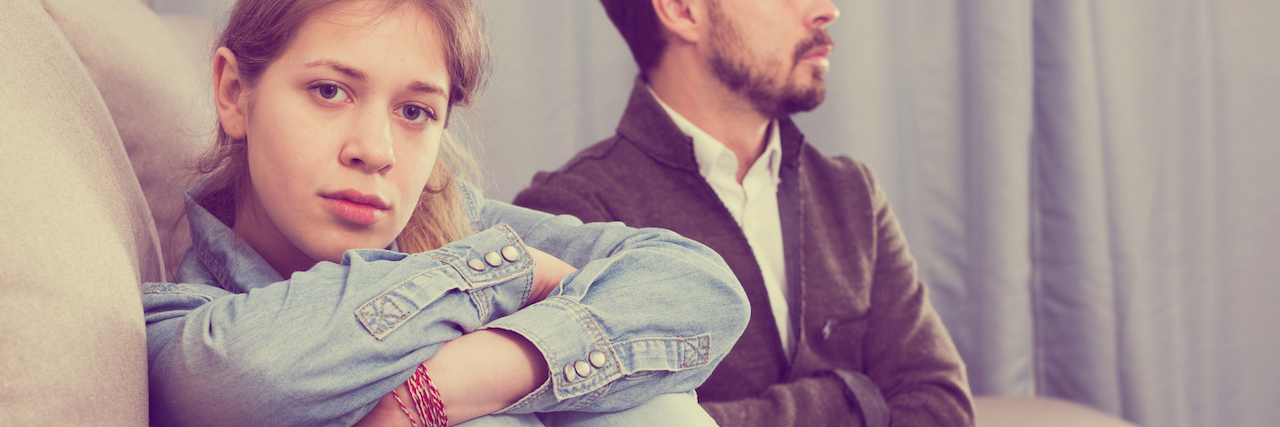 What to Say to a Child Struggling With Mental Illness A young woman and her father sitting on the couch