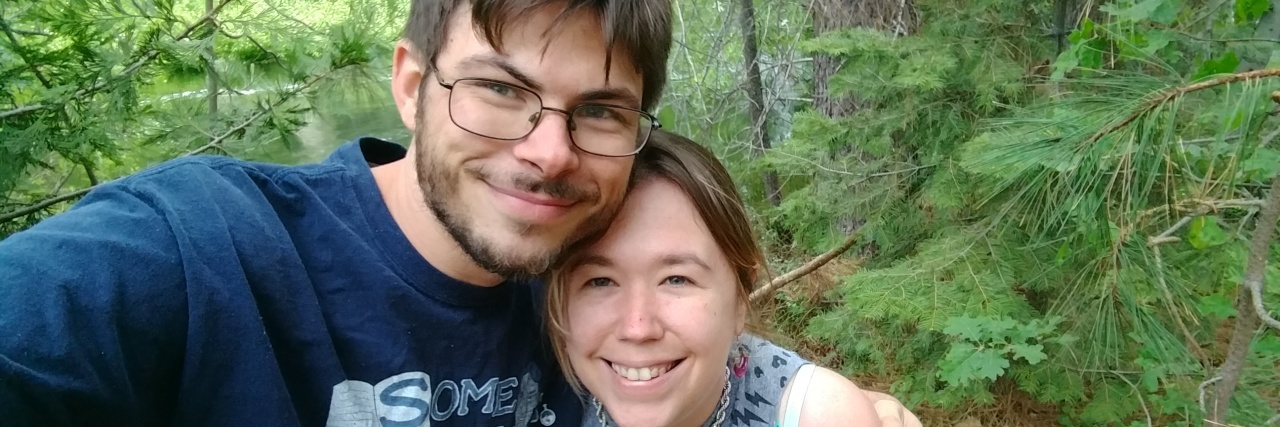 Living With Autism and Social Anxiety Kourtnie and her fiance outside.