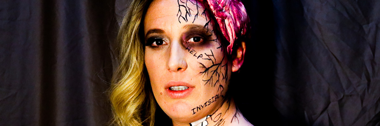 Making My Traumatic Brain Injury Visible Nikki Stang wearing makeup to visualize her traumatic brain injury.