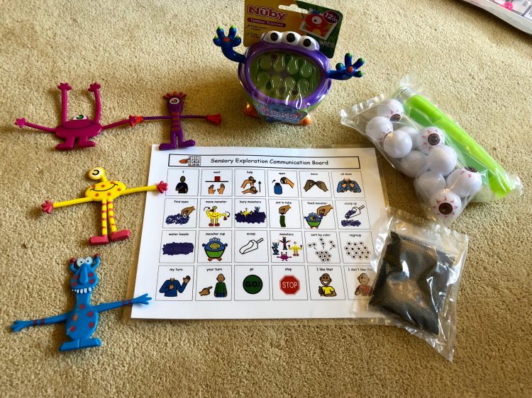 EarlyVention monster activity box, includes laminated directions with word choices, four nedable monsters, a monster cup, monster eyes, scoop and water beads