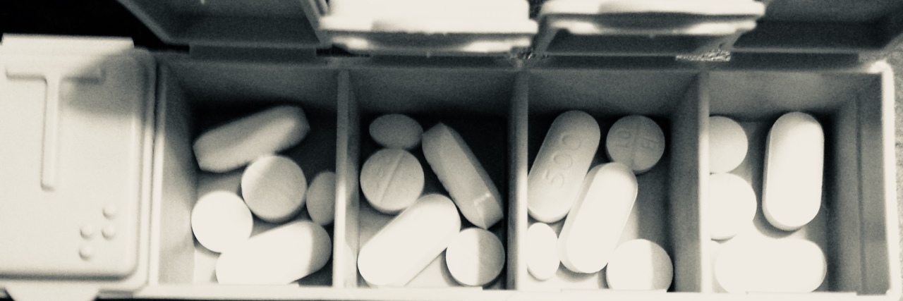 When I Felt Envious of Those on 'the Other Side of Sick' A picture of a pill divider.