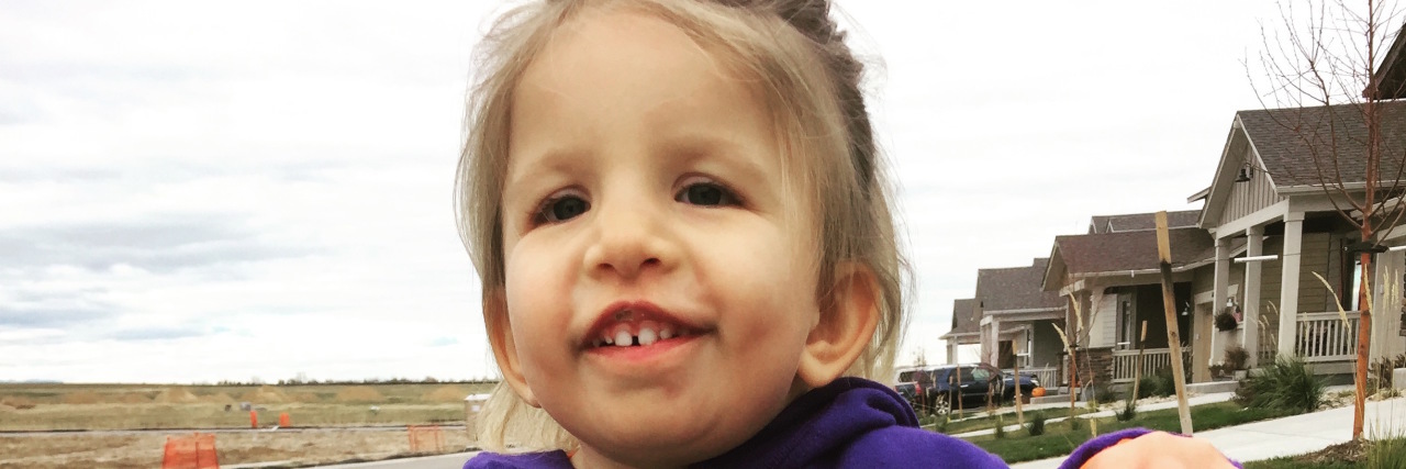 Changing How You Speak About Your Medically Complex Child The author's daughter, Lyra, with her assistive walking device