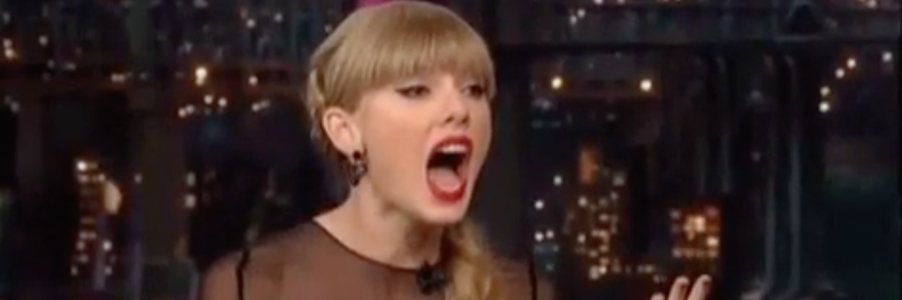 14 GIFs That Perfectly Describe the Frustrations of Lyme Disease A screen shot of a GIF of Taylor Swift, reacting with hands in the air and her mouth open wide.