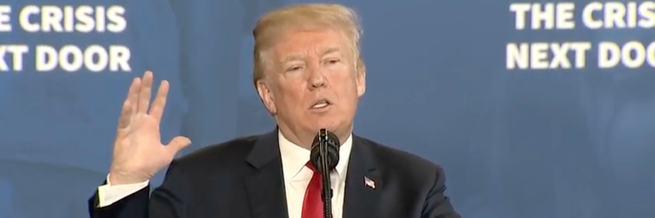 Photo of Trump speaking.