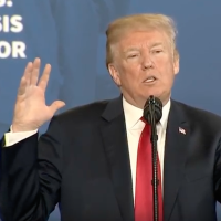 Photo of Trump speaking.
