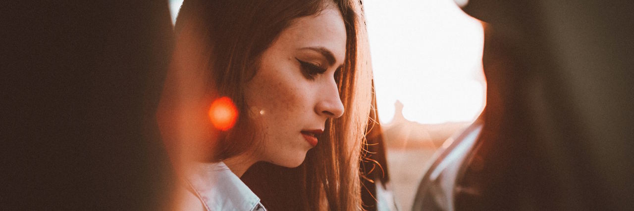 What It's Really Like to Be 'Sooooo OCD' woman looking out window