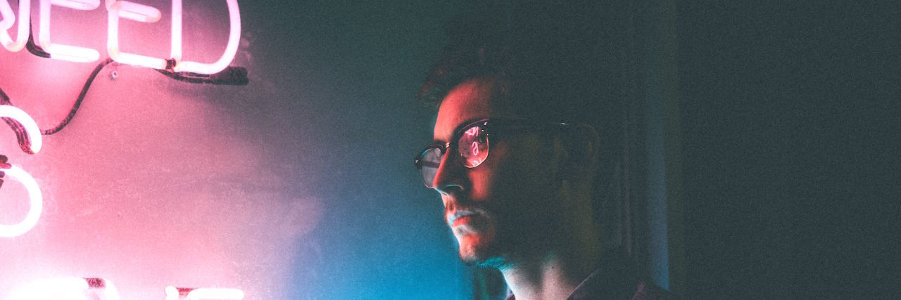 Inside the Mind of Someone With PTSD at Night man neon light